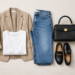 Minimal neutral outfit using wardrobe basics including white t-shirt, straight-leg jeans, blazer and loafers styled in a clean, effortless way.