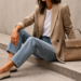 Minimalist outfit with blazer, white t-shirt and jeans styled with loafers showing a simple outfit idea that looks polished and expensive.